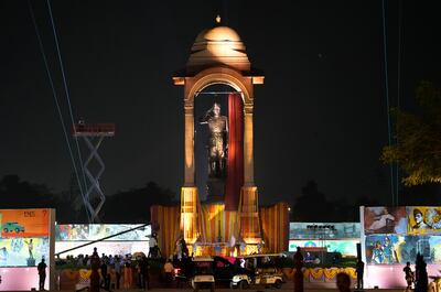 Indian Prime Minister Narendra Modi unveils a statue of Subhash Chandra Bose in New Delhi. AP