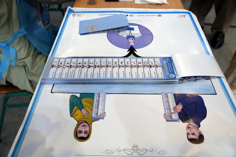 A ballot paper is seen on the table at a polling station at Amani high school, near the presidential palace in Kabul, Afghanistan. AP Photo