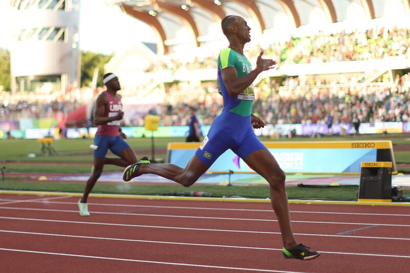 Alison dos Santos crosses the finish line to win gold in the men's 400m hurdles final. AFP