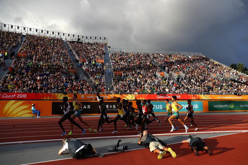 Athletes compete in the Men's 5,000 metres final on day four of the Gold Coast 2018 Commonwealth Games at Carrara Stadium, Australia. Michael Steele / Getty Images