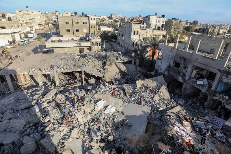 Homes lie in ruins after Israeli air strikes. Getty Images