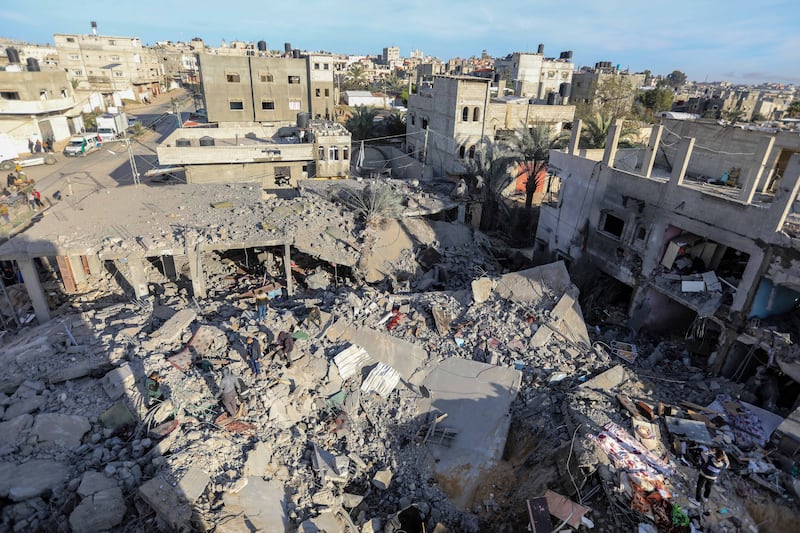Homes lie in ruins after Israeli air strikes. Getty Images
