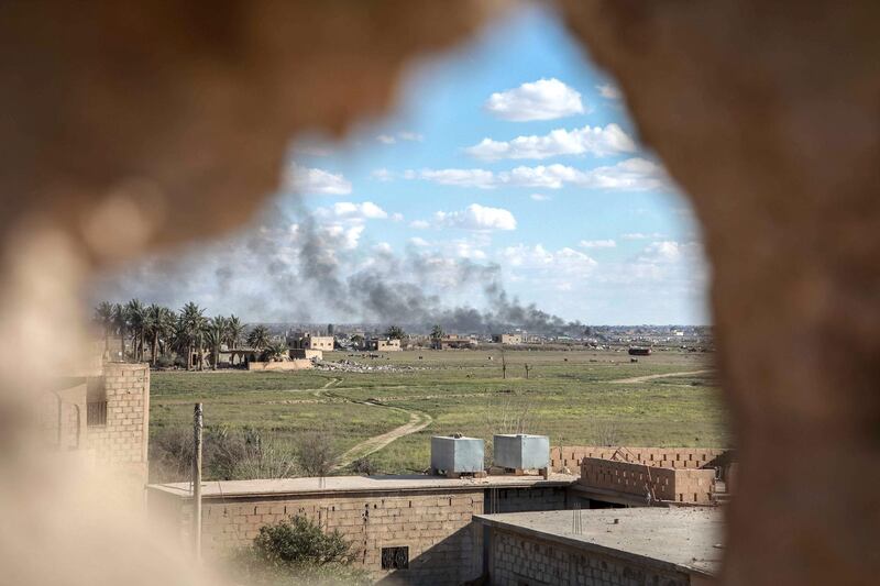 ISIS-held Baghouz, in Syria's Deir Ezzour province, viewed from an SDF frontline position on 3 March 2019. Campbell MacDiarmid