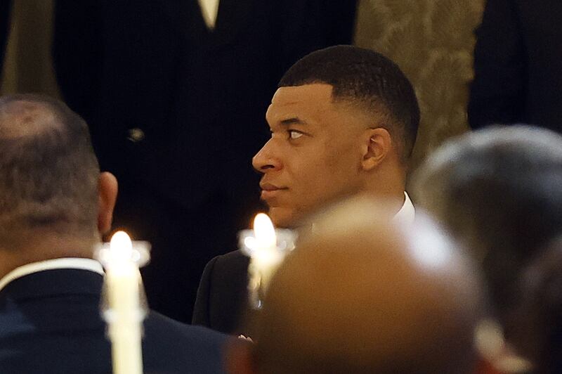 Mbappe at the state dinner. EPA