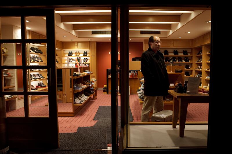 Kenji Masaoka, 63, stands inside his shoe shop 'Regal Shoes' in Ishinomaki in Miyagi prefecture, Japan on Feb 28, 2012 as he prepares for the shop's reopening on March 2. Masaoka's two shoe shops were flooded with mud and heavily damaged by the massive tsunami hit northern Japan on March 11, 2011.
Photo by Kuni Takahashi