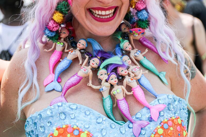 A participant wears a mermaid necklace during the 37th Annual Mermaid Parade in the Coney Island section of Brooklyn in New York.  Reuters