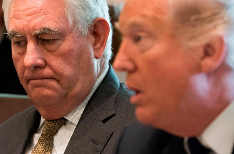 US President Donald Trump speaks alongside Secretary of State Rex Tillerson (L) during a Cabinet Meeting in the Cabinet Room of the White House in Washington, DC, October 16, 2017. / AFP PHOTO / SAUL LOEB
