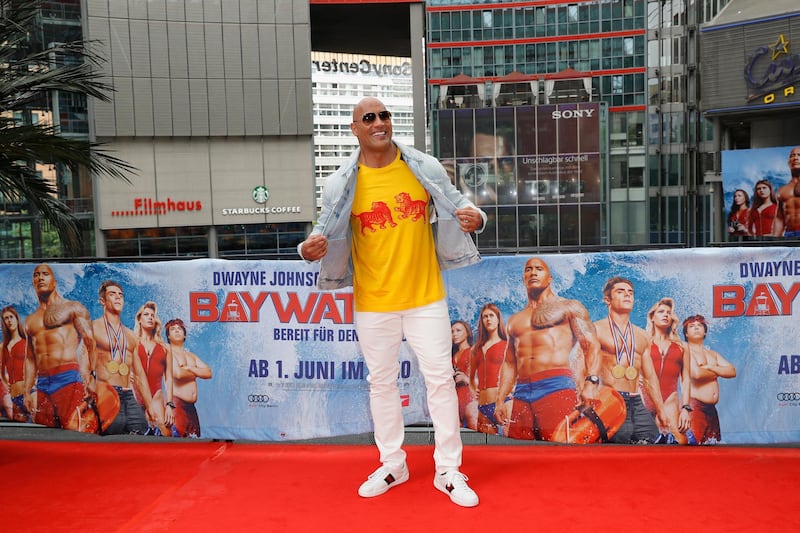 BERLIN, GERMANY - MAY 30: Dwayne Johnson poses at the 'Baywatch' Photo Call at Sony Centre on May 30, 2017 in Berlin, Germany. (Photo by Andreas Rentz/Getty Images for Paramount Pictures)