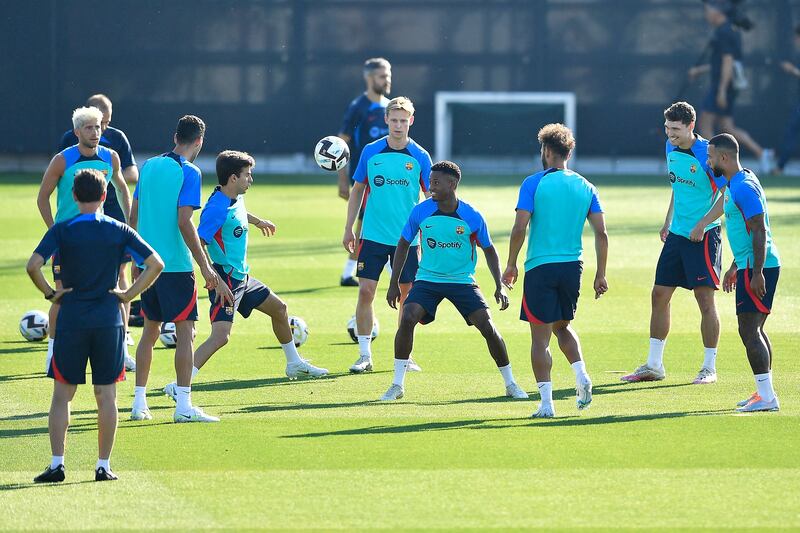 Barcelona's Frenkie de Jong and teammates train. AFP