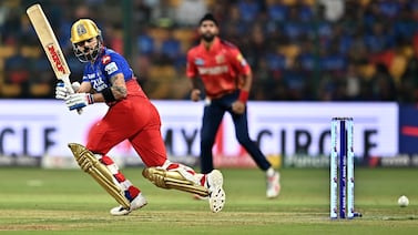 Royal Challengers Bengaluru's Virat Kohli watches the ball after playing a shot during the Indian Premier League (IPL) Twenty20 cricket match between Royal Challengers Bengaluru and Punjab Kings at the M.  Chinnaswamy Stadium in Bengaluru on March 25, 2024.  (Photo by Idrees MOHAMMED  /  AFP)  /  -- IMAGE RESTRICTED TO EDITORIAL USE - STRICTLY NO COMMERCIAL USE --