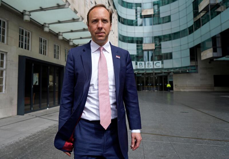 Britain's Health Secretary Matt Hancock leaves the BBC in central London on May 16, 2021, after appearing on the BBC political programme The Andrew Marr Show.  England will take the next step of reopening on Monday as planned, but the final stage, currently scheduled for June 21, could be in doubt after a rise in cases of the Indian coronavirus variant.
 / AFP / Niklas HALLE'N
