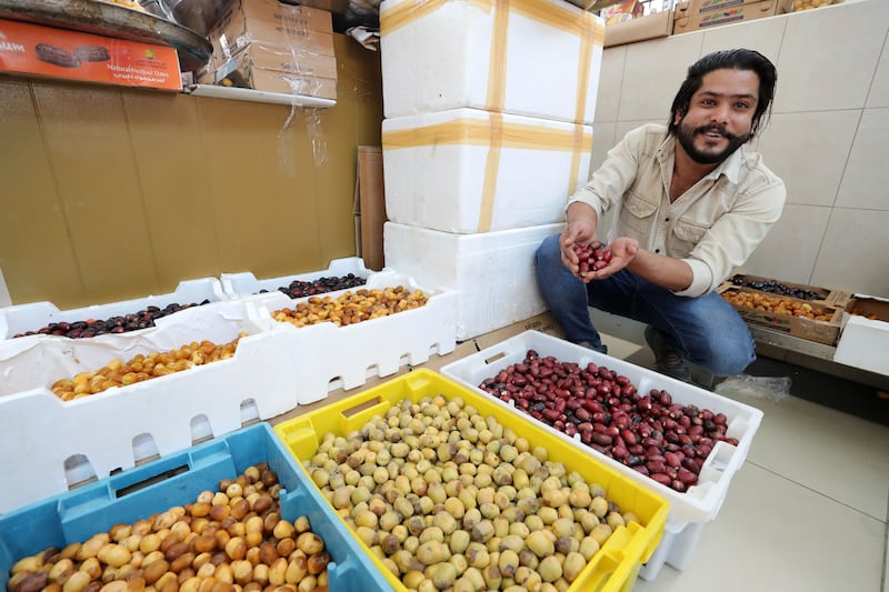 Mohammed Ashraf shows some of his produce. He calls the Khalas variety 'the king of dates, as it is the most popular'.