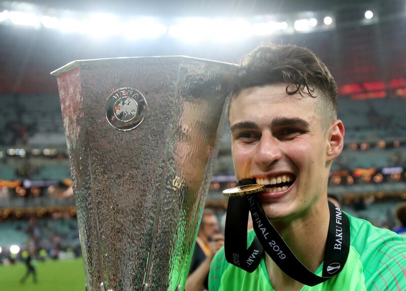 Chelsea's Kepa Arrizabalaga celebrates winning the Europa League with the trophy. REUTERS