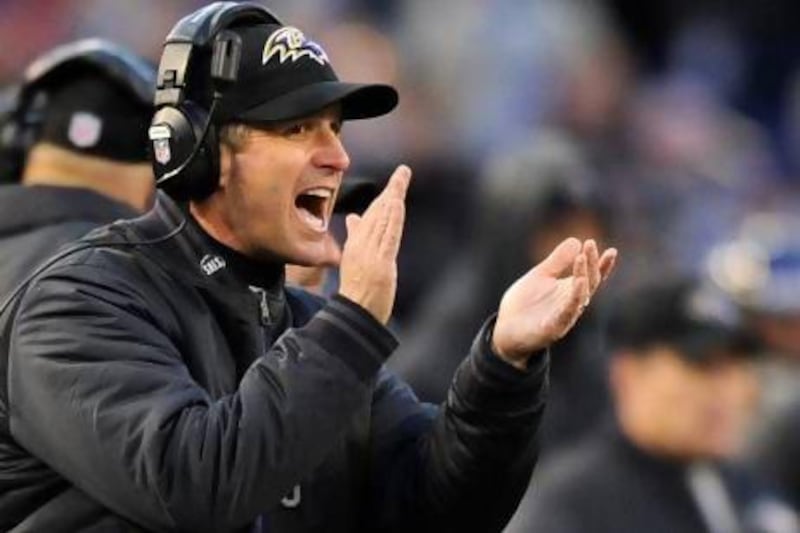 FILE - In this Dec. 23, 2012 file photo, Baltimore Ravens head coach John Harbaugh yells from the sideline in the first half of an NFL football game against the New York Giants in Baltimore. The Harbaughs, San Francisco's Jim and Baltimore's John, will be the first pair of brothers to coach against each other in the NFL title game. (AP Photo/Nick Wass, FIle) *** Local Caption *** Super Bowl Lookahead Football.JPEG-0d65b.jpg