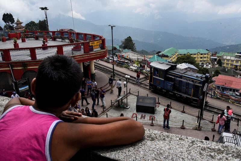 An engine belonging to the Darjeeling Himalayan Railway leaves a station in Darjeeling.