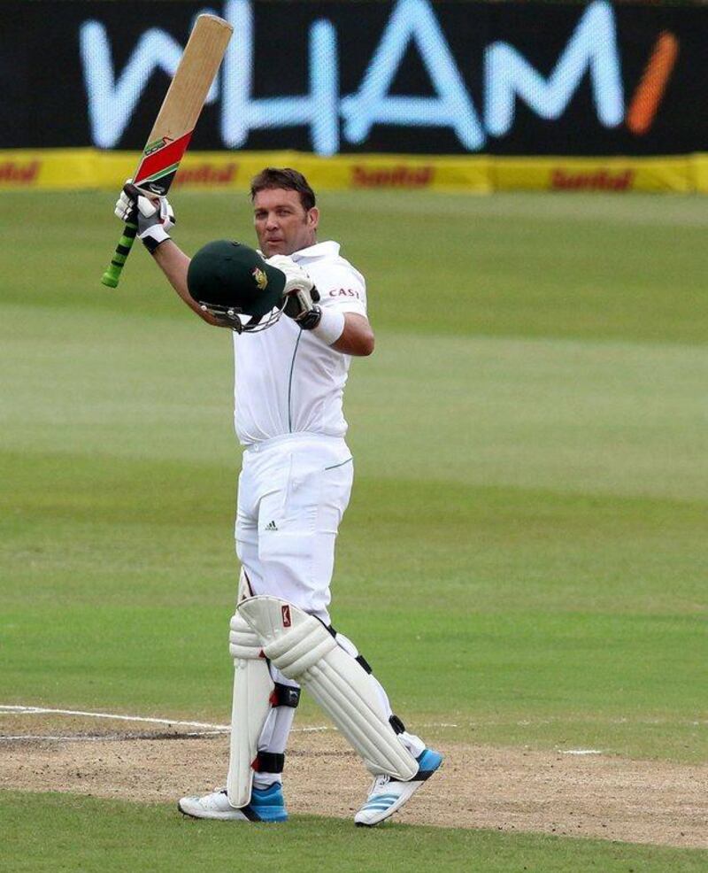 South Africa's Jacques Kallis celebrates after scoring a century to become the third leading run scorer of all time during Day 4 of the second and final cricket Test match against India in Durban on Sunday.  Anesh Debiky / AFP