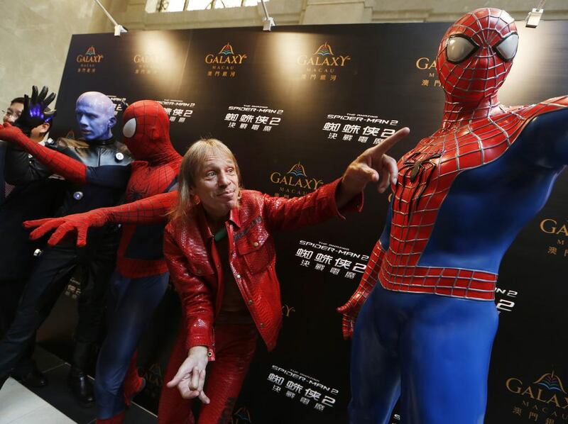 Alain Robert poses at a promotional event for the movie The Amazing Spider-Man 2. Kin Cheung / AP photo