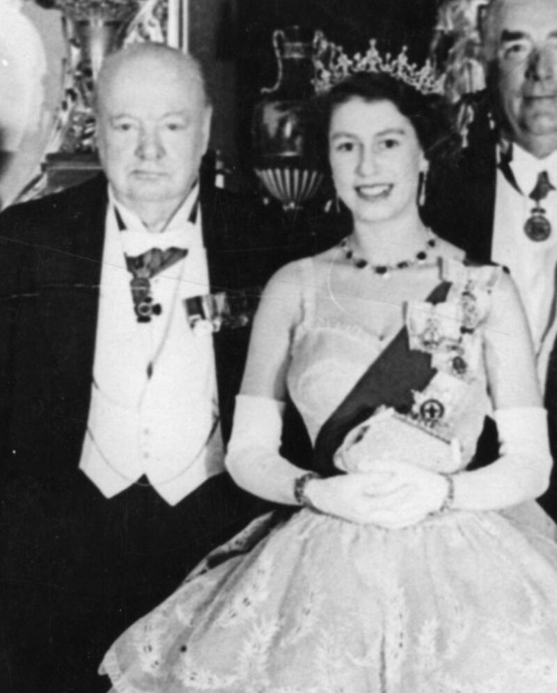 Prime Minister Winston Churchill and Queen Elizabeth II attending the Commonwealth Economic Conference at Buckingham Palace in 1952. PA