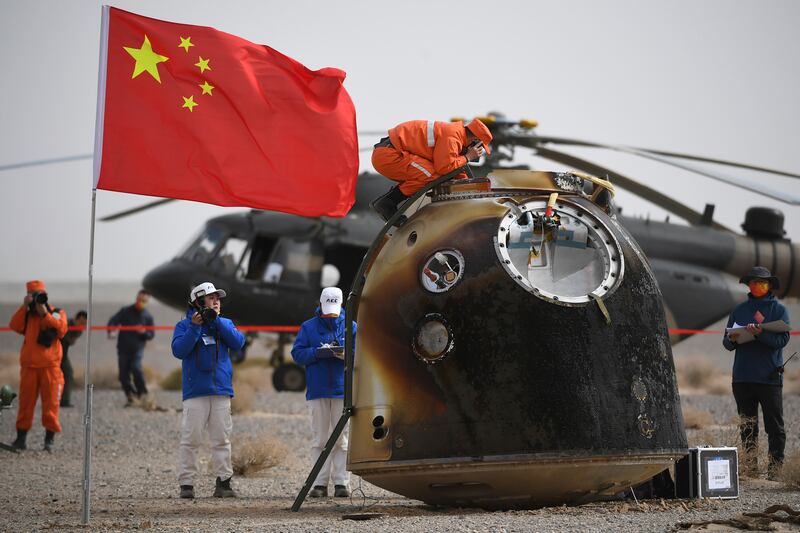 The capsule at the Dongfeng landing site in Inner Mongolia. AP