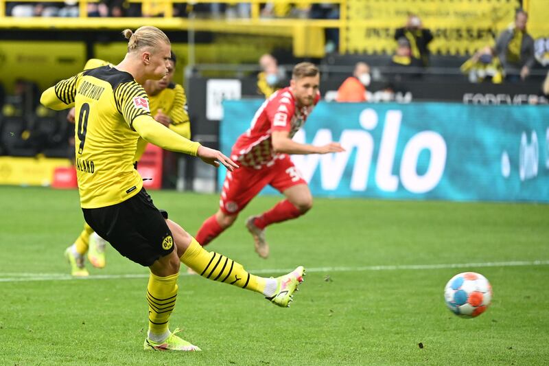 Dortmund forward Erling Haaland scores a penalty in the Bundesliga match against Mainz in October, 2021. AFP