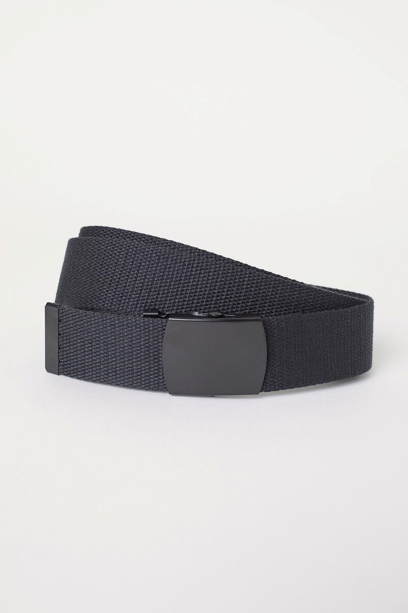 A webbing belt with a suave metal buckle will look great with any casual attire, Wear it with your favourite white tee and denim jeans; H&M, Dh26