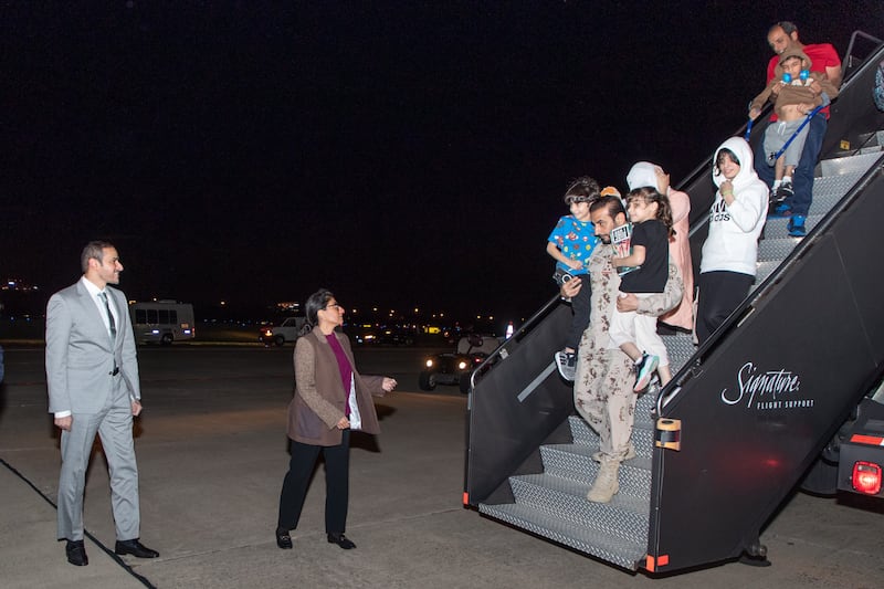 Emiratis are greeted on to the Washington tarmac before being transported to hotels.
