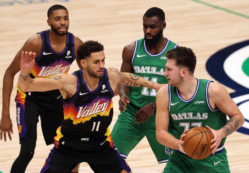 Abdel Nader on defense against Dallas Mavericks guard Luka Doncic. AFP