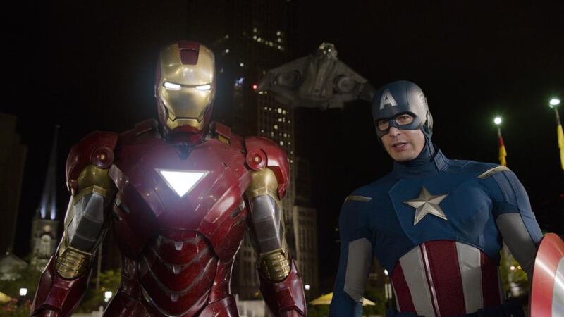 Iron Man, portrayed by Robert Downey Jr, left, and Captain America, portrayed by Chris Evans, are shown in a scene from The Avengers. AP Photo / Disney