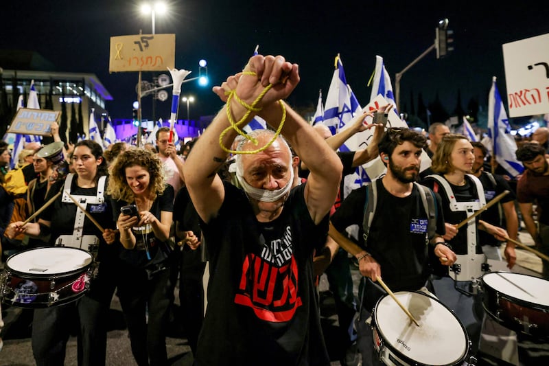 Many protesters accuse Mr Netanyahu of failing to protect the country from Hamas. AFP
