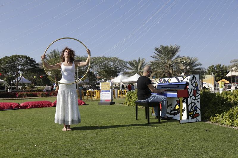 Hula-hoop artist Teeba Al Khudairi and pianist Maan Hamadeh. Jeffrey E Biteng / The National