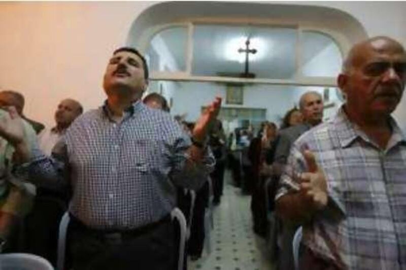 Iraqi Christians attend a mass prayer at the Assyrian church in Amman, Jordan October 19, 2008. (Salah Malkawi/ The National) *** Local Caption ***  SM005_Christians.jpg