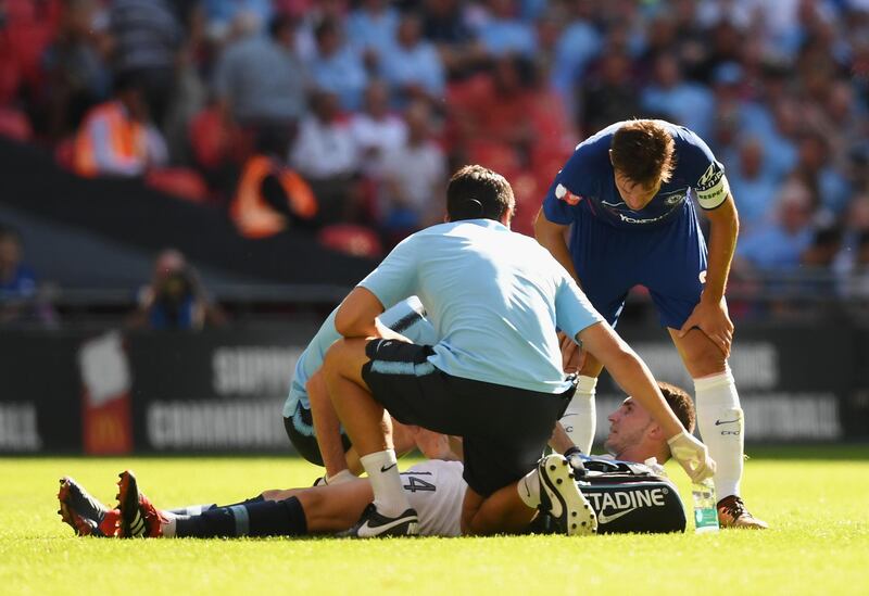 LONDON, ENGLAND - AUGUST 05:  Aymeric Laporte of Manchester City lies injured during the FA Community Shield between Manchester City and Chelsea at Wembley Stadium on August 5, 2018 in London, England.  (Photo by Michael Regan/Getty Images)