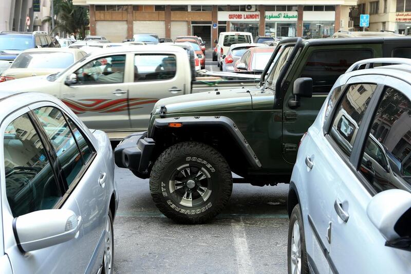 A car parked in no parking area blocked other vehicles in Al Zahia. Ravindranath K / The National