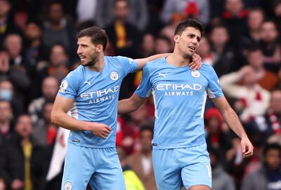 Manchester City's Ruben Dias, left, has praised the influence of teammate Rodri, right. Reuters