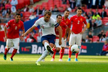 England's striker Harry Kane shoots from the penalty spot to score his team's second goal during the UEFA Euro 2020 qualifying first round Group A football match between England and Bulgaria at Wembley Stadium in London on September 7, 2019. NOT FOR MARKETING OR ADVERTISING USE / RESTRICTED TO EDITORIAL USE / AFP / Ian KINGTON / NOT FOR MARKETING OR ADVERTISING USE / RESTRICTED TO EDITORIAL USE
