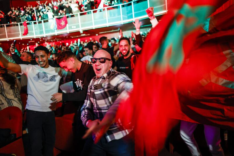 Moroccan fans celebrate at the Amsterdam Meervaart. AFP