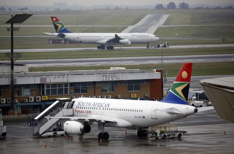 FILE PHOTO: A South African Airways (SAA) plane is towed at O.R. Tambo International Airport in Johannesburg, South Africa, January 18, 2020. Picture taken January 18, 2020. REUTERS/Rogan Ward/File Photo