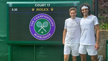 Skander Mansouri, right, and Nicolas Mahut at Wimbledon. Photo: Skander Mansouri