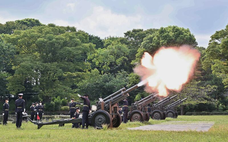Members of Japan's Ground Self-Defence Force take part in a 19-gun salute for the funeral. AFP