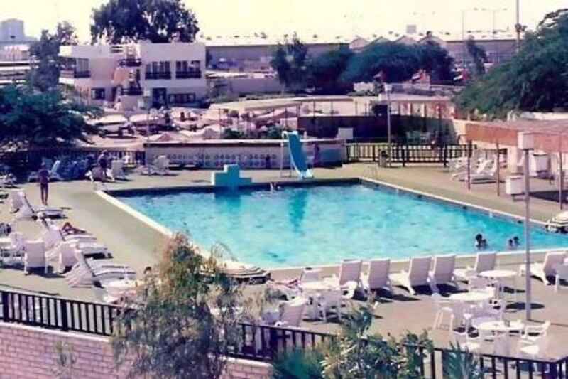 The swimming pool of Al Mina's The Club is shown in the 1980s. Sheikh Zayed gifted the land the venue sits on.