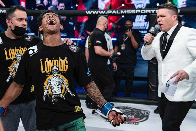 Vinicius de Oliveira, the new UAE Warriors bantamweight champion, reacts after defeating Moroccan Xavier Alaoui at the Jiu-Jitsu Arena on Saturday, March 20, 2021. Courtesy Palms Sports. Action arenâ€™t great (he is in green shorts)