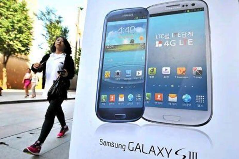 Shares in Samsung Electronics fell 7 per cent in Seoul after a US court fined the company for breaching Apple's patents. Jung Yeon-Je / AF