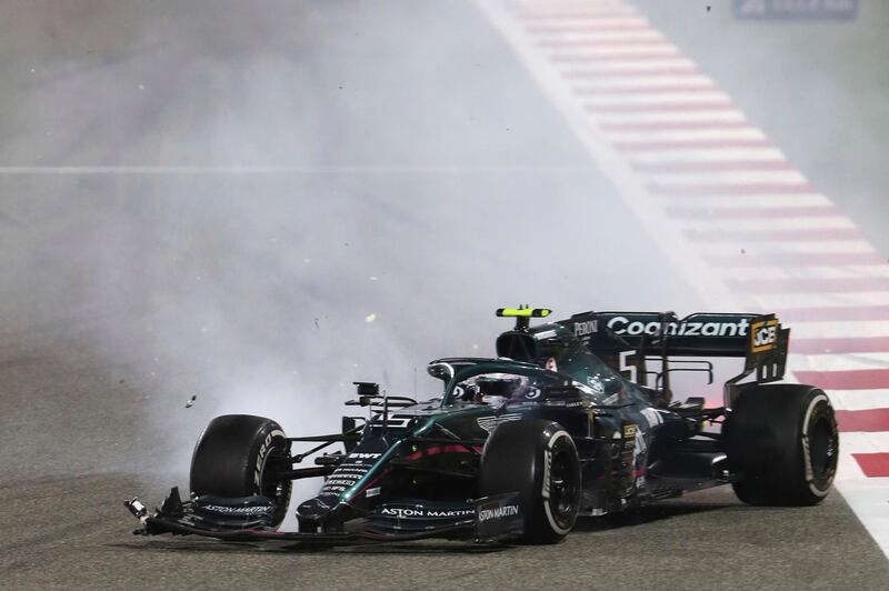 Aston Martin driver Sebastian Vettel crashes with Alpine driver Esteban Ocon during the Bahrain GP. PA