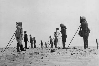 December 1960: A set of dummies propped up in the Sahara Desert awaiting a third atomic bomb explosion during the French nuclear testing. The third test, codenamed Gerboise Rouge or 'Red Jerboa', took place outside Reggane in Algeria. Keystone/Getty Images