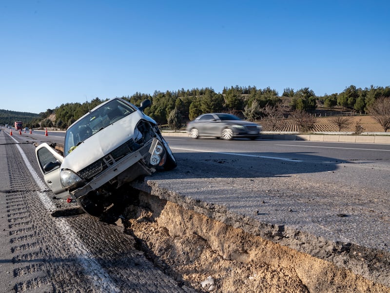 Motorway fractured by earthquake causes car crash near Kahramanmaras, Turkey. Matt Kynaston / The National