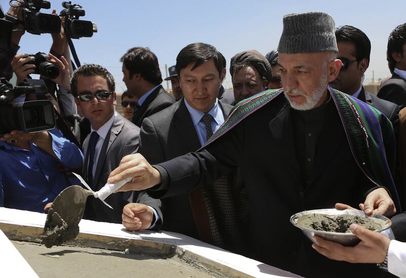 Afghan president Hamid Karzai at an inauguration ceremony of a residential area in Kabulin 2013. Omar Sobhani / Reuters