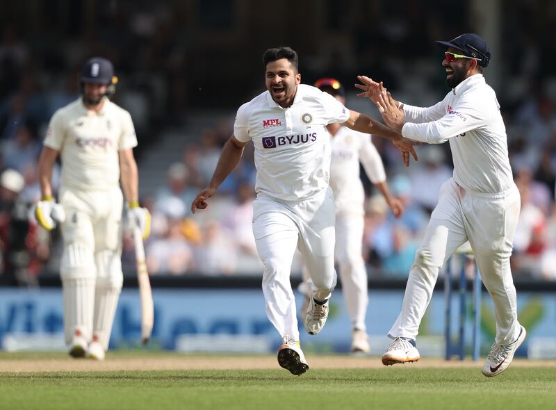 India's Shardul Thakur celebrates claiming the wicket of Joe Root. Getty