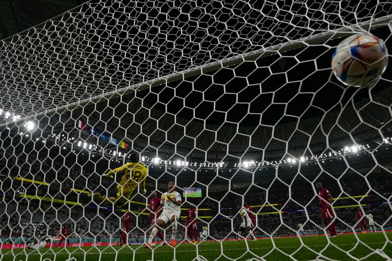 Famara Diedhiou's header hits the back of the net to make it 2-0 to Senegal. AP