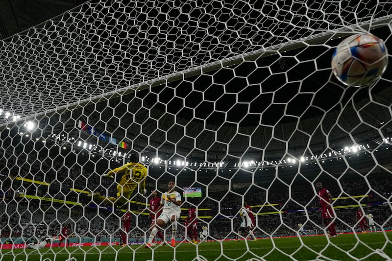 Famara Diedhiou's header hits the back of the net to make it 2-0 to Senegal. AP