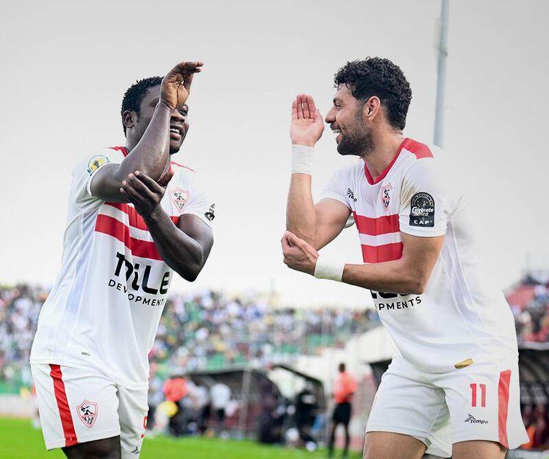 Zamalek forward Samson Akinyoola, left, and Mostafa Shalaby, right, celebrate after the former put the Egyptian side 2-0 up against Dreams.